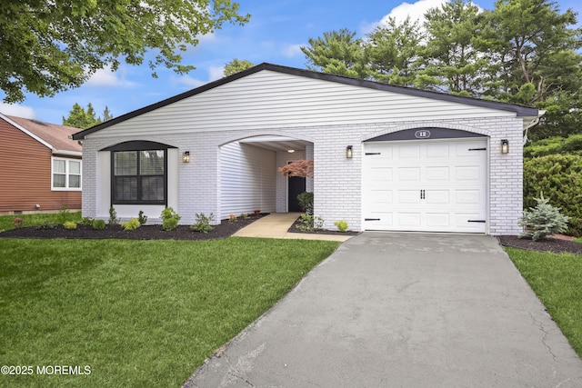 12 Weston Ct, Marlboro, NJ 07746 - single story home with a front yard, driveway, brick siding, and a garage