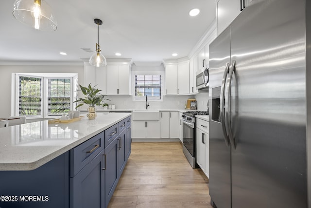 12 Weston Ct, Marlboro, NJ 07746 - kitchen with appliances with stainless steel finishes, white cabinetry, recessed lighting, light wood-style flooring, and decorative backsplash