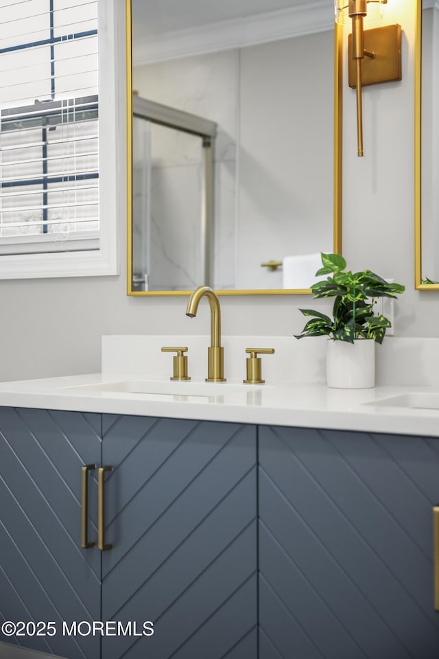 12 Weston Ct, Marlboro, NJ 07746 - bathroom with double vanity and ornamental molding