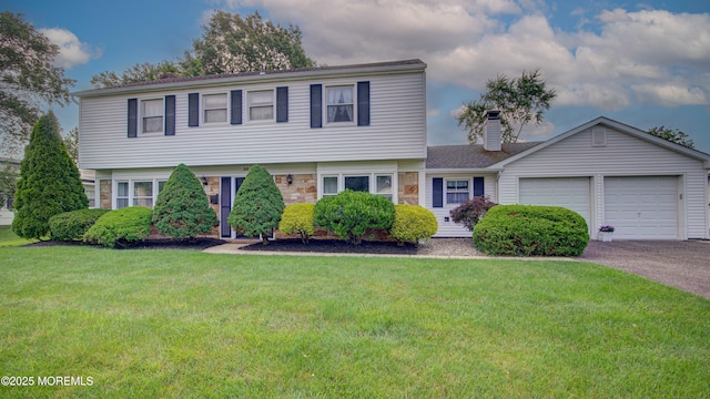 20 Kenwood Ln, Old Bridge, NJ 08857 - colonial inspired home with an attached garage, driveway, a chimney, and a front yard
