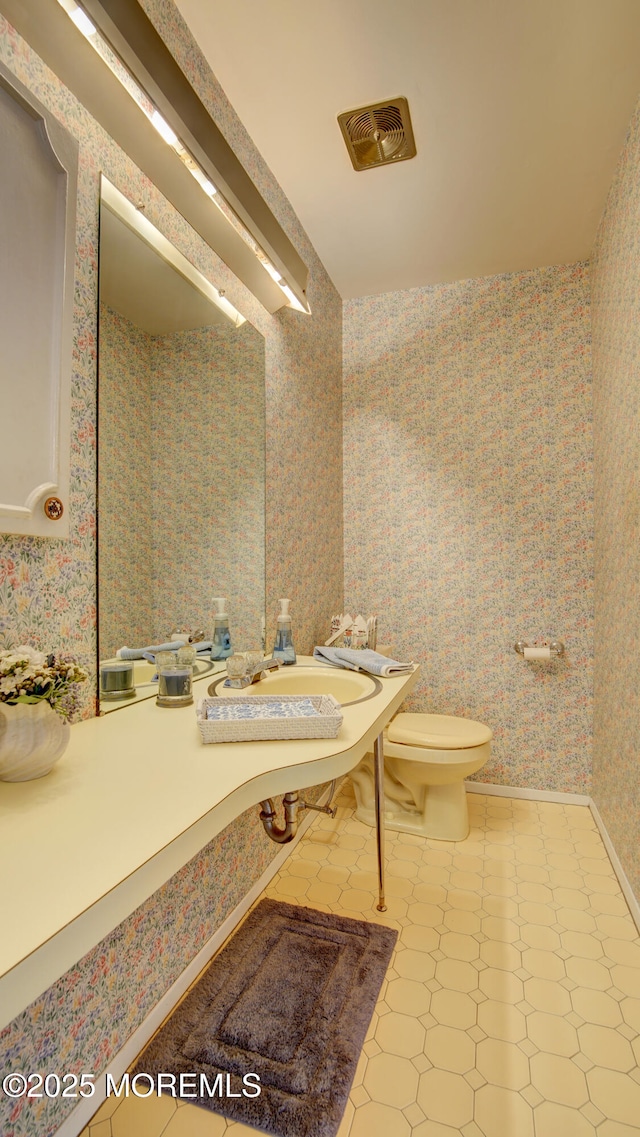 20 Kenwood Ln, Old Bridge, NJ 08857 - half bath featuring tile patterned floors and wallpapered walls