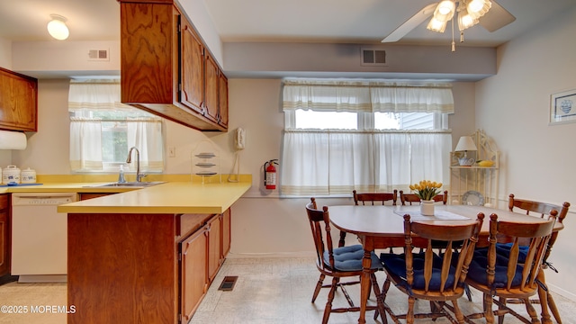 20 Kenwood Ln, Old Bridge, NJ 08857 - dining room featuring healthy amount of natural light, ceiling fan, and light floors