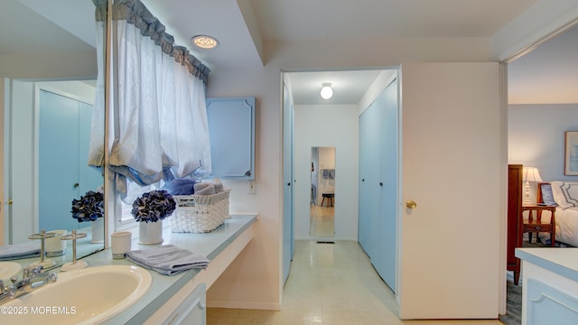 20 Kenwood Ln, Old Bridge, NJ 08857 - bathroom featuring vanity and baseboards