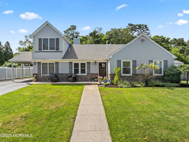 102 Oak Glen Rd, Toms River, NJ 08753 - view of front of property with a chimney, a shingled roof, an outdoor hangout area, a carport, and driveway