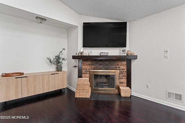 102 Oak Glen Rd, Toms River, NJ 08753 - living room featuring lofted ceiling, a fireplace, and dark wood finished floors