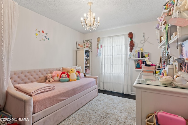102 Oak Glen Rd, Toms River, NJ 08753 - bedroom featuring a chandelier and a textured ceiling