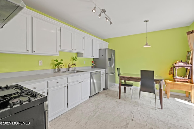 7 Warbler Rd, Marlboro, NJ 07746 - kitchen with appliances with stainless steel finishes, white cabinets, decorative light fixtures, light countertops, and light marble finish floors