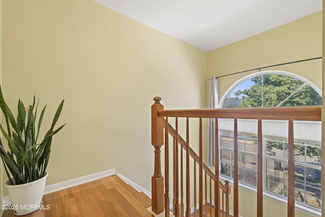 7 Warbler Rd, Marlboro, NJ 07746 - corridor with an upstairs landing and light wood-style flooring