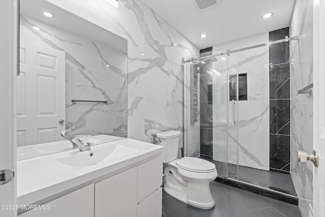 7 Warbler Rd, Marlboro, NJ 07746 - bathroom featuring a marble finish shower, vanity, recessed lighting, and tile walls