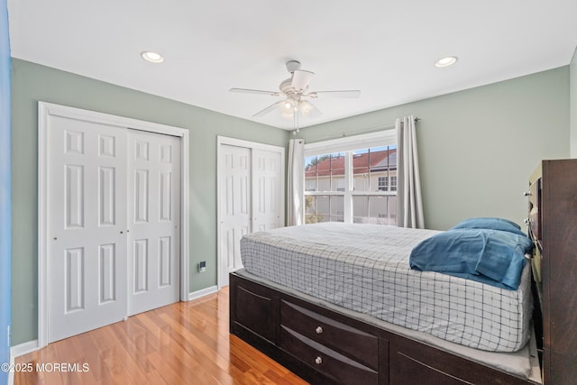 7 Warbler Rd, Marlboro, NJ 07746 - bedroom featuring multiple closets, light wood-style flooring, recessed lighting, and ceiling fan