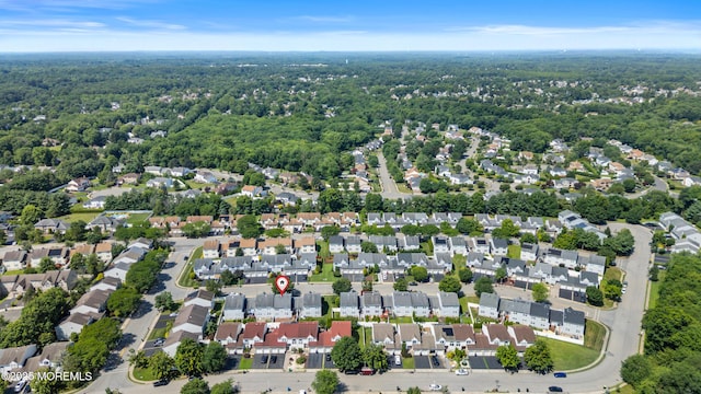 7 Warbler Rd, Marlboro, NJ 07746 - aerial perspective of suburban area featuring a heavily wooded area