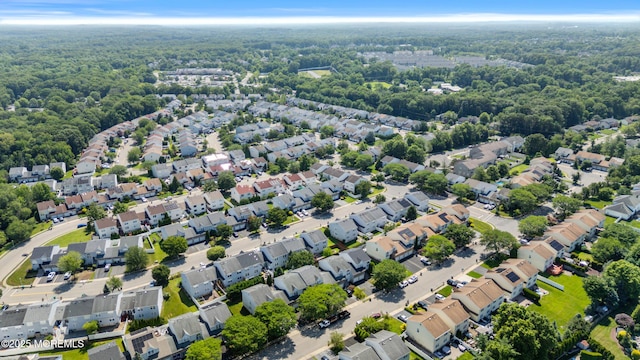 7 Warbler Rd, Marlboro, NJ 07746 - aerial perspective of suburban area featuring a forest