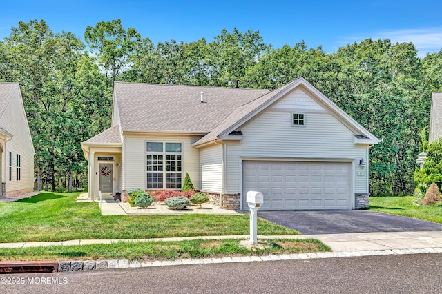 43 Westport Dr, Barnegat, NJ 08005 - traditional-style house with asphalt driveway, stone siding, a front yard, and a shingled roof