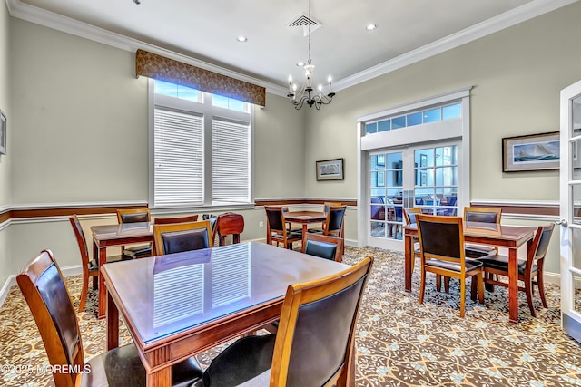 43 Westport Dr, Barnegat, NJ 08005 - carpeted dining room featuring crown molding, a chandelier, and wainscoting