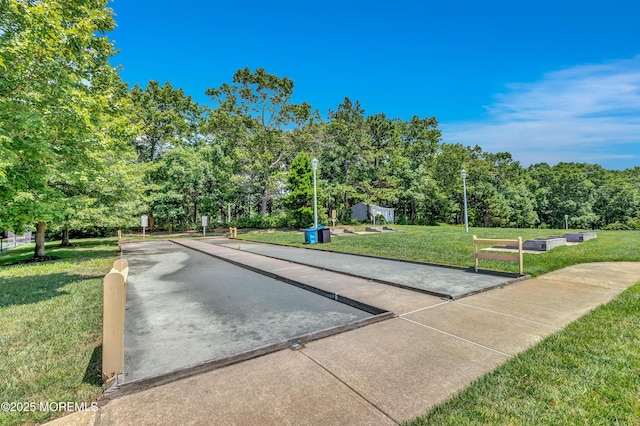43 Westport Dr, Barnegat, NJ 08005 - view of home's community featuring a game area, a yard, and a view of trees