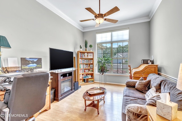 43 Westport Dr, Barnegat, NJ 08005 - living room with crown molding, ceiling fan, light wood finished floors, and a glass covered fireplace