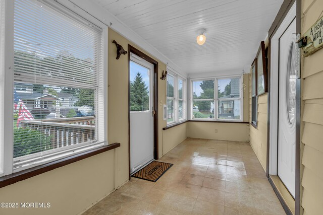 833 Lincoln St, Red Bank, NJ 07701 - unfurnished sunroom with tile patterned flooring