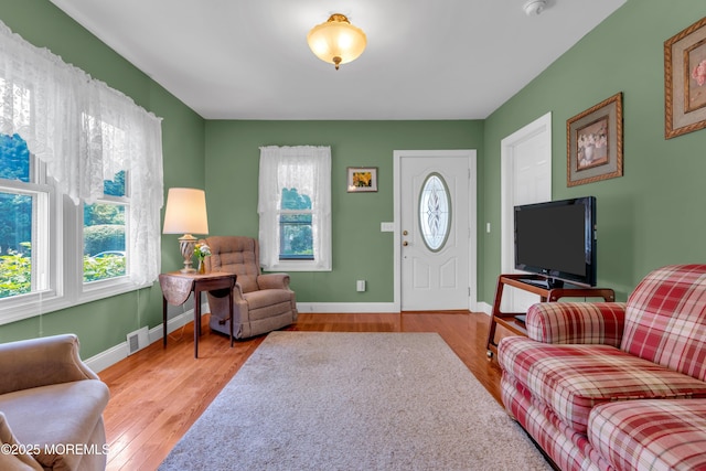 833 Lincoln St, Red Bank, NJ 07701 - living area with healthy amount of natural light and wood finished floors