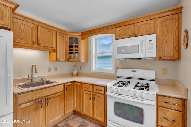 833 Lincoln St, Red Bank, NJ 07701 - kitchen featuring white appliances, glass insert cabinets, and light countertops