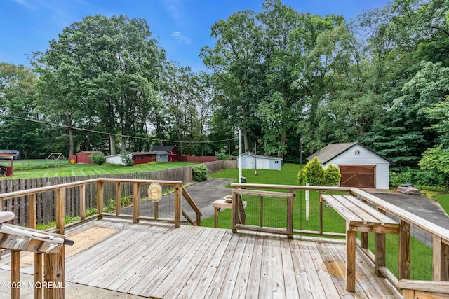 833 Lincoln St, Red Bank, NJ 07701 - wooden deck featuring a shed, view of scattered trees, and a garage