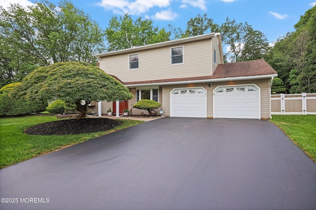 3 Sudbury Rd, Morganville, NJ 07751 - view of front facade with asphalt driveway