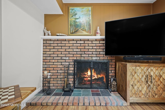 3 Sudbury Rd, Morganville, NJ 07751 - detailed view of a brick fireplace and wood finished floors