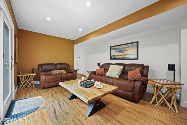 3 Sudbury Rd, Morganville, NJ 07751 - living area featuring light wood-style flooring and recessed lighting