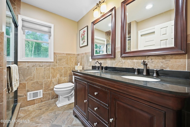 3 Sudbury Rd, Morganville, NJ 07751 - full bath featuring double vanity, tile walls, and an enclosed shower