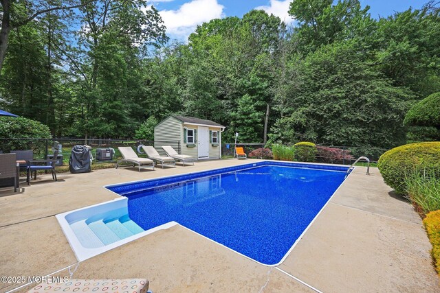 3 Sudbury Rd, Morganville, NJ 07751 - view of swimming pool featuring a patio and an outbuilding