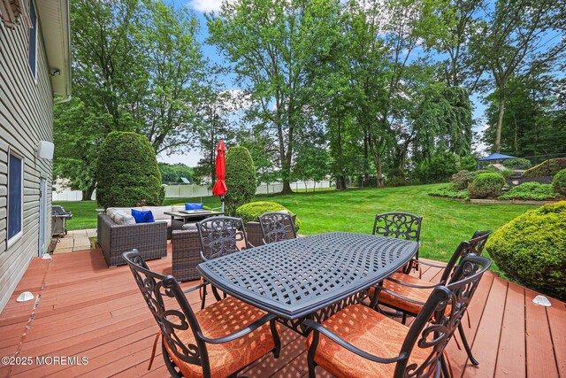 3 Sudbury Rd, Morganville, NJ 07751 - wooden deck featuring outdoor dining area, an outdoor living space, a fenced backyard, and grilling area