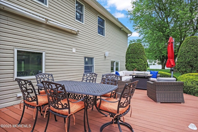 3 Sudbury Rd, Morganville, NJ 07751 - wooden terrace with an outdoor living space with a fire pit and outdoor dining area