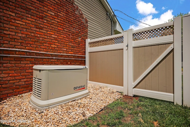 3 Sudbury Rd, Morganville, NJ 07751 - exterior view of brick siding and a gate