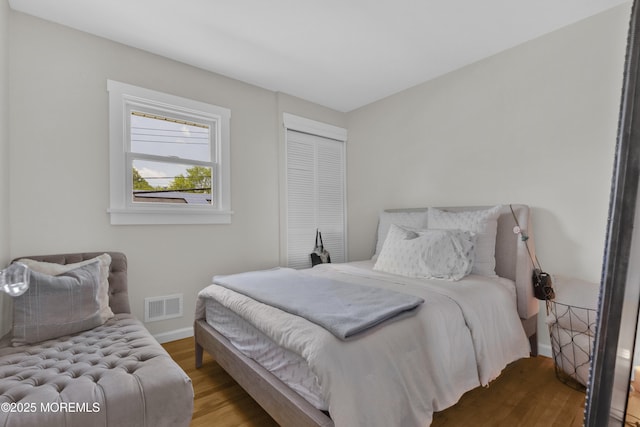 405 Orange Ave, Union Beach, NJ 07735 - bedroom featuring wood finished floors and a closet