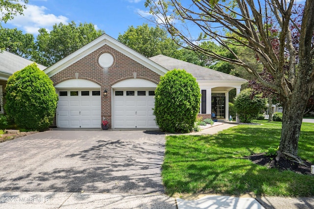 1 Silverspring Dr, Lakewood, NJ 08701 - ranch-style home featuring brick siding, a front yard, asphalt driveway, and a garage