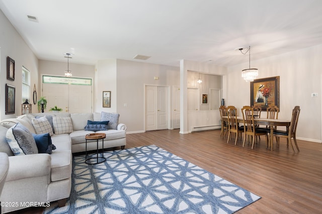 1 Silverspring Dr, Lakewood, NJ 08701 - living room featuring baseboard heating and wood finished floors