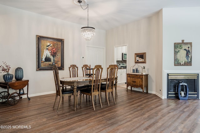 1 Silverspring Dr, Lakewood, NJ 08701 - dining space featuring a chandelier and dark wood finished floors