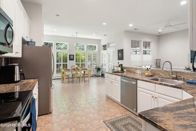 1 Silverspring Dr, Lakewood, NJ 08701 - kitchen featuring appliances with stainless steel finishes, dark countertops, recessed lighting, ceiling fan, and white cabinetry