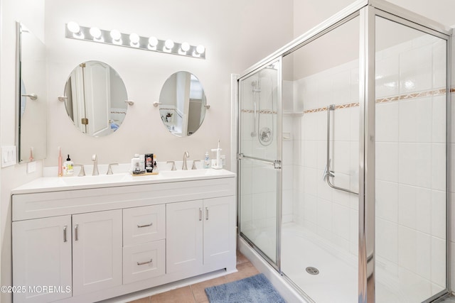 1 Silverspring Dr, Lakewood, NJ 08701 - full bath with a shower stall, double vanity, and tile patterned flooring