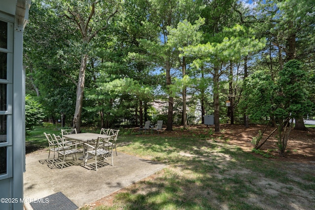 1 Silverspring Dr, Lakewood, NJ 08701 - view of yard with a patio area, outdoor dining area, and view of wooded area