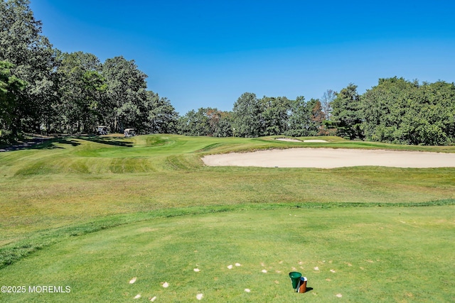 1 Silverspring Dr, Lakewood, NJ 08701 - view of community featuring golf course view, view of wooded area, and a lawn