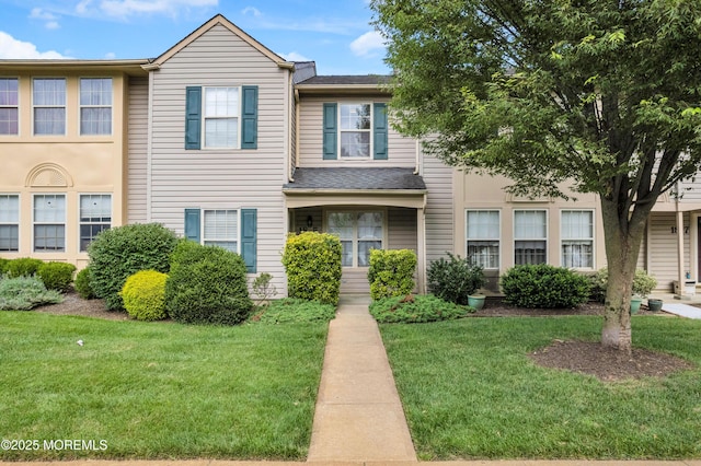 18 Remington Dr Unit 5, Freehold, NJ 07728 - townhome / multi-family property with a front lawn