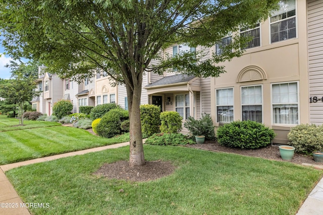 18 Remington Dr Unit 5, Freehold, NJ 07728 - view of property featuring a front lawn