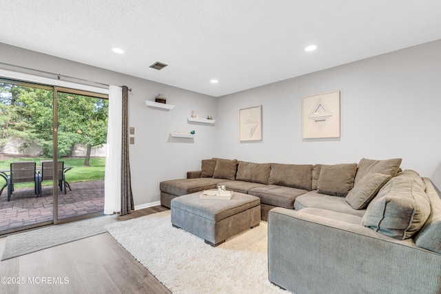 18 Remington Dr Unit 5, Freehold, NJ 07728 - living area featuring wood finished floors and recessed lighting