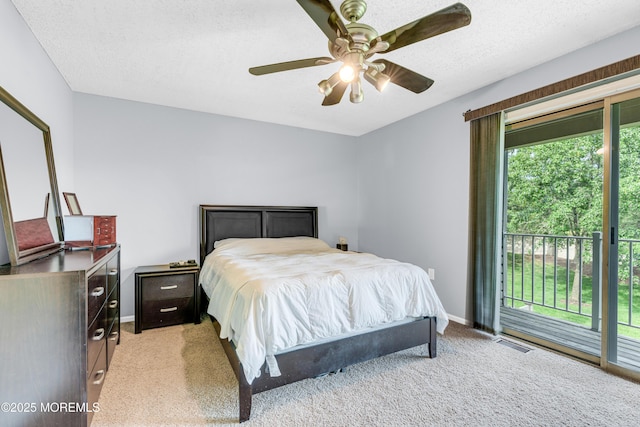 18 Remington Dr Unit 5, Freehold, NJ 07728 - bedroom featuring access to exterior, light colored carpet, ceiling fan, and a textured ceiling