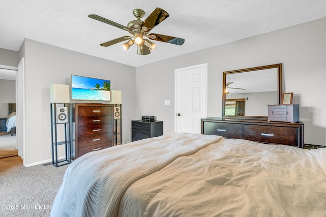 18 Remington Dr Unit 5, Freehold, NJ 07728 - carpeted bedroom featuring a textured ceiling and a ceiling fan