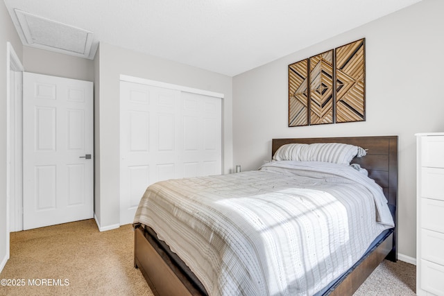 18 Remington Dr Unit 5, Freehold, NJ 07728 - bedroom featuring light colored carpet, a closet, and attic access