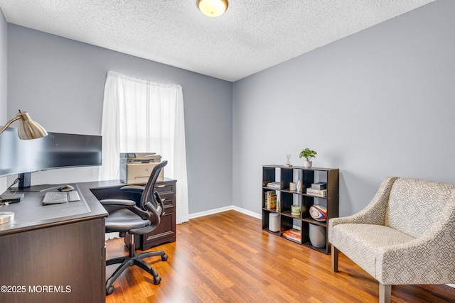 18 Remington Dr Unit 5, Freehold, NJ 07728 - home office featuring wood finished floors and a textured ceiling