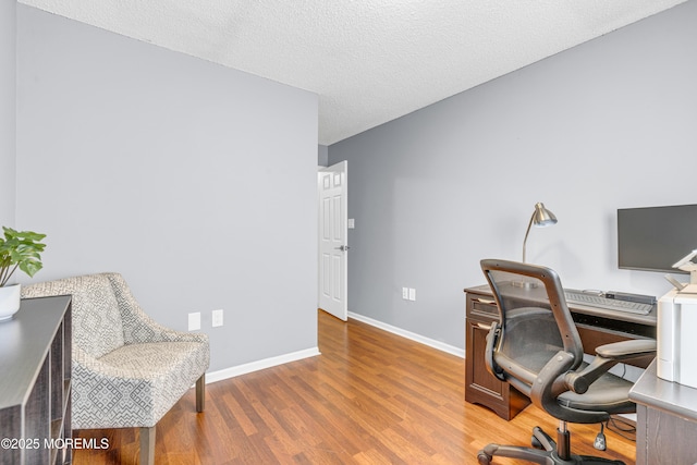 18 Remington Dr Unit 5, Freehold, NJ 07728 - office area featuring wood finished floors and a textured ceiling