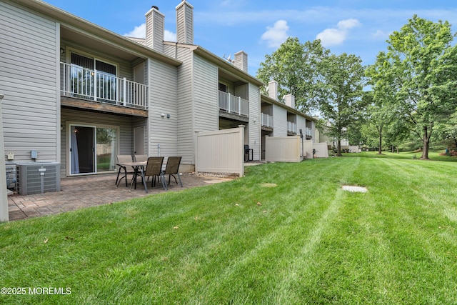 18 Remington Dr Unit 5, Freehold, NJ 07728 - view of grassy yard with a patio area
