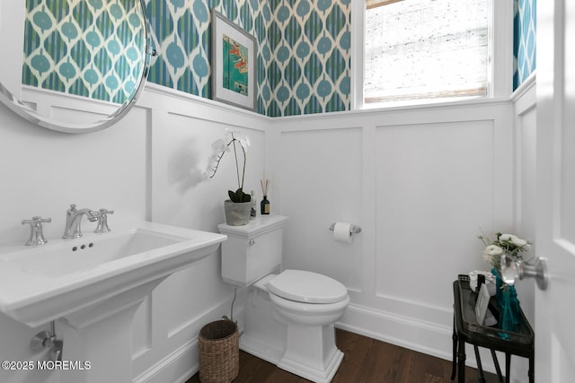29 Allen St, Rumson, NJ 07760 - bathroom featuring a decorative wall, wood finished floors, and wainscoting